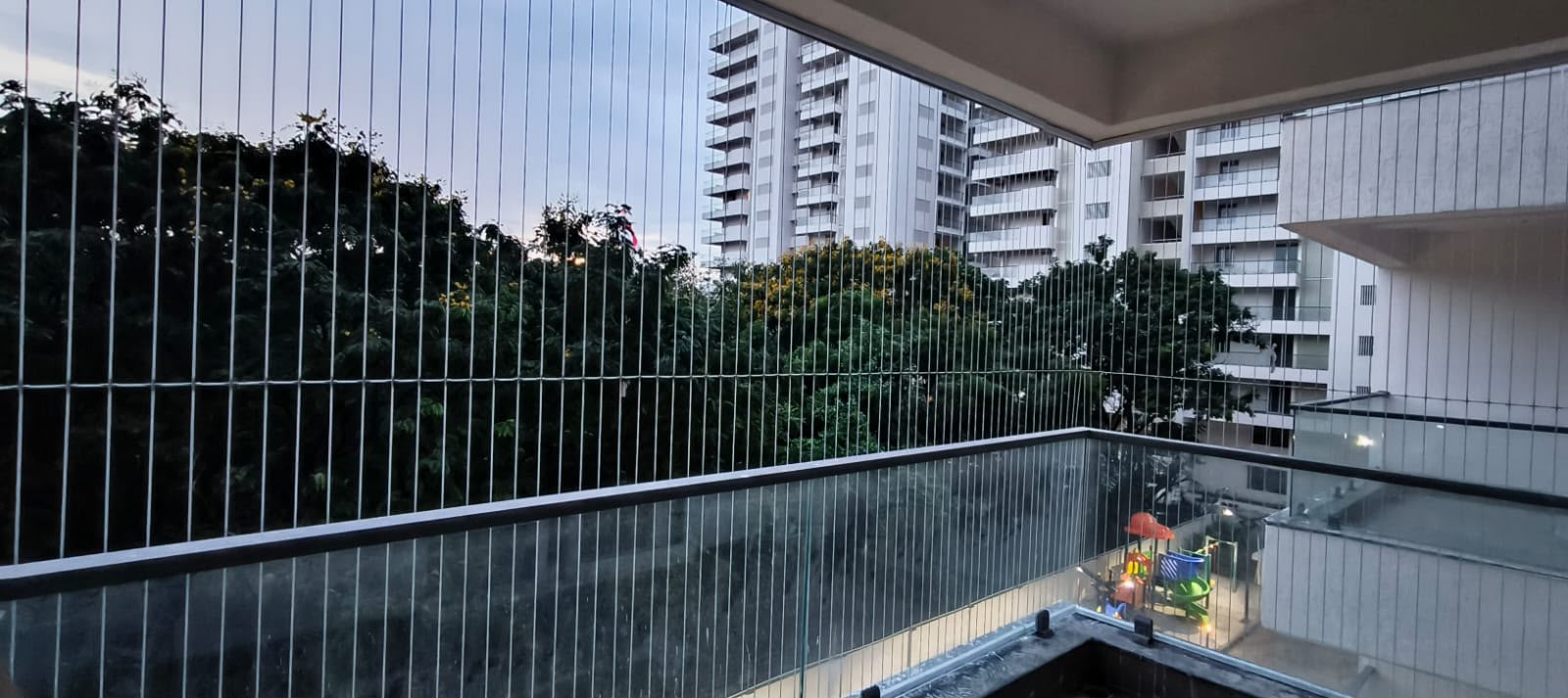 Invisible grille safety net fitted on a Bengaluru balcony
